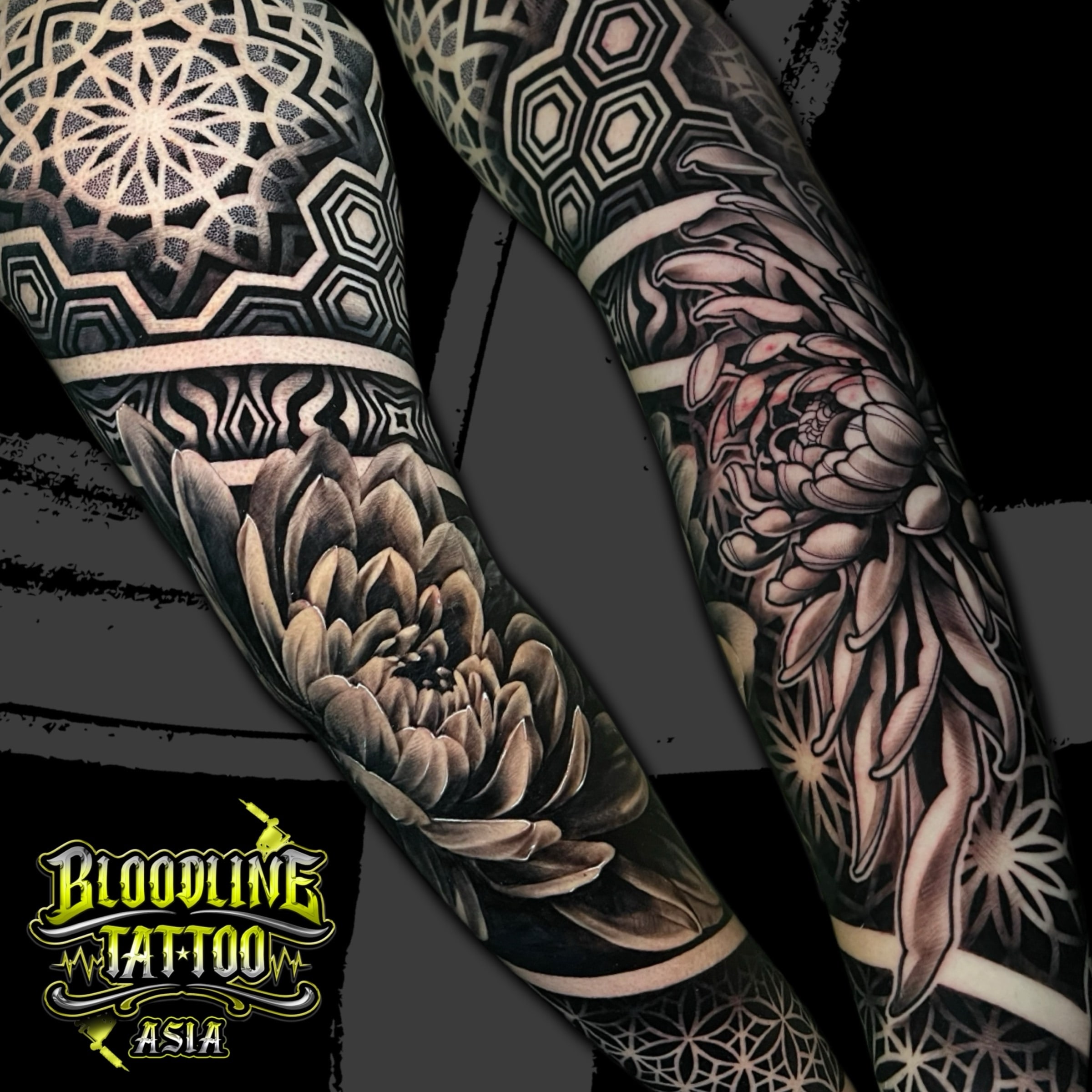 Dual-angle full arm sleeves with layered mandalas, Flower of Life hex grids, and shaded chrysanthemum florals in black and grey dotwork, at Bloodline Tattoo Bali.